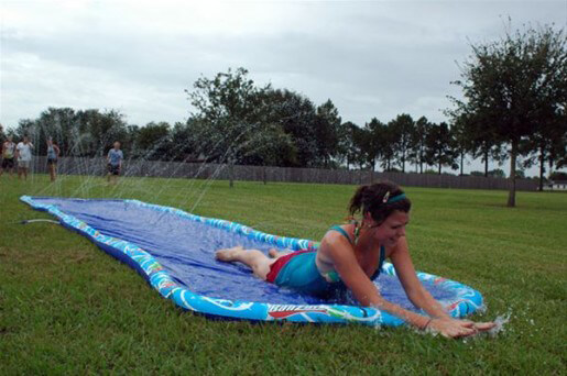 women using a slip-n-slide